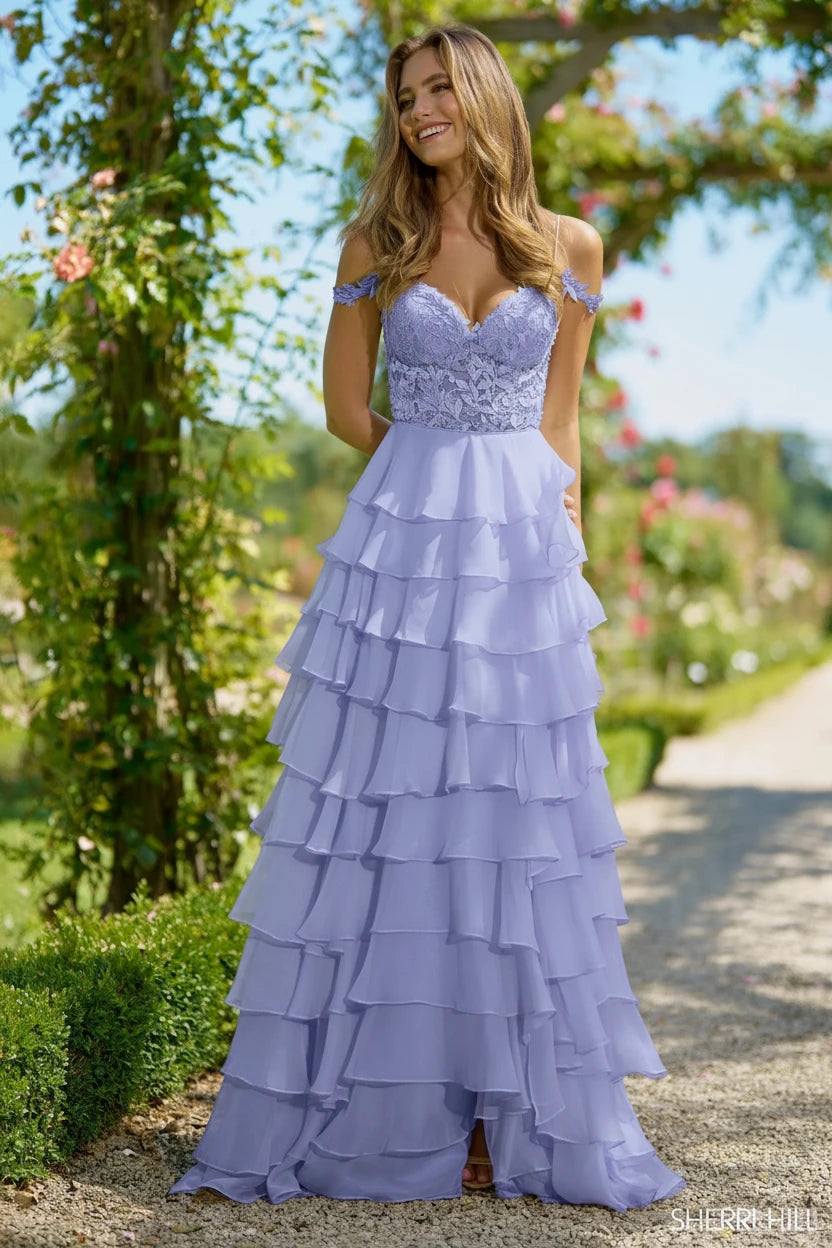 sherri hill periwinkle corset dress Dance the night away in the playful periwinkle gown from Sherri Hill! Style 57976 is a stunning sparkly corset style gown with perfect cutouts and a side slit! Available in store in